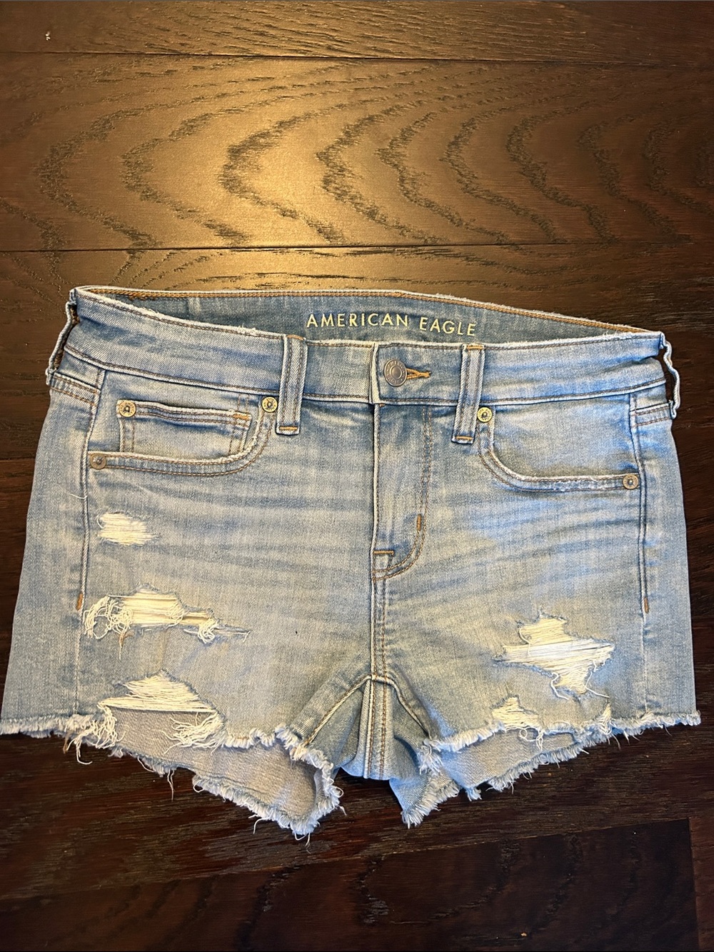 American Eagle Light Wash Distressed Denim Shortie Shorts size 4